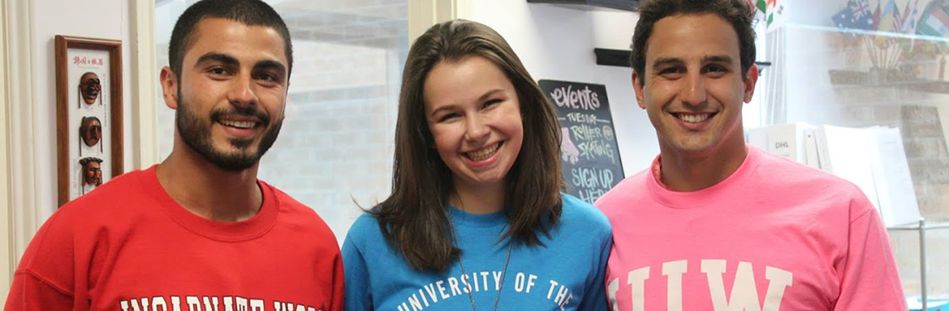 Smiling students in UIW shirts
